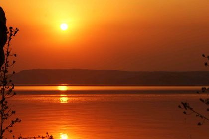 Solnedgang ved Mantali-demningen