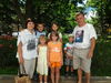Lera (in orange) and her family