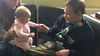 Arturos (17) plays with Noelle, the daughter of Micala Siler (Doorways to Hope)
